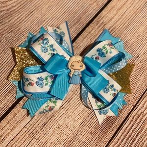 2 Frozen theme handmade hair bows.